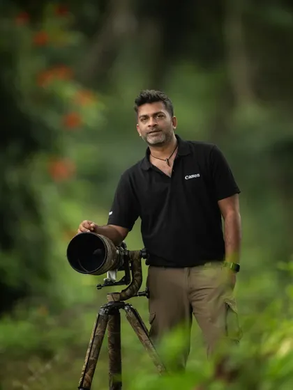 With my camera and tripod, ready for action in the forest. I provide on-field coaching to help you get the most out of your own equipment.