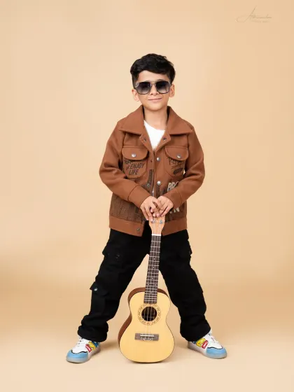 A confident and cool stance from this young rockstar, ready to take on the world.