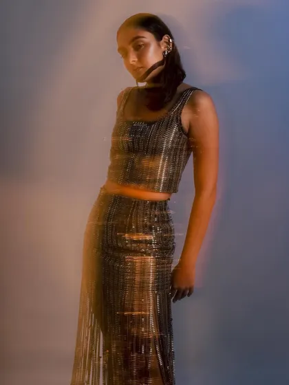 A motion-blur shot from "The Sea of Life" editorial, where the wet hairstyle adds to the fluid, underwater theme.