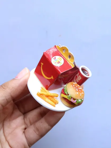 A close-up of a miniature Happy Meal, a fun and nostalgic creation from my course.