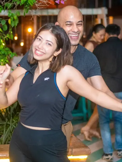 Look at that smile! This is what happens when great music and great company come together for a night of Bachata and Salsa.