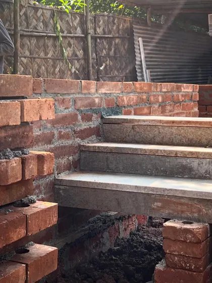 A detail of the brick and laterite foundation work at Aadi Villa. We are recalibrating traditional building techniques for contemporary use, focusing on sustainability and local craft.