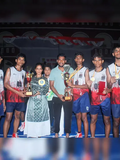 Our coaches and players with the trophies from the inter-school Kho-Kho tournament.