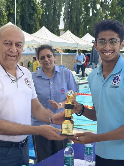 Aneesh Gowda receiving the Best Male Swimmer award at the NRJ State Senior Championships.