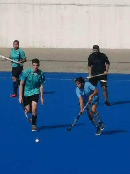 An attacking player dribbles past a defender. These individual skills are honed through countless hours of practice.