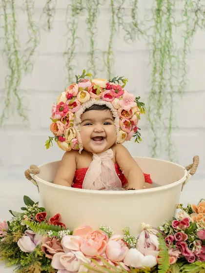Another joyful shot from the bathtub splash session. Her happy expression is absolutely infectious.