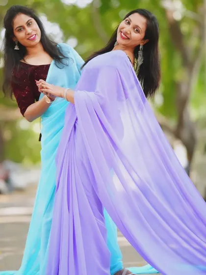 Two models showcasing my trail sarees in complementary colors, sky blue and lavender. This is a great option for a photoshoot with a friend or sister.