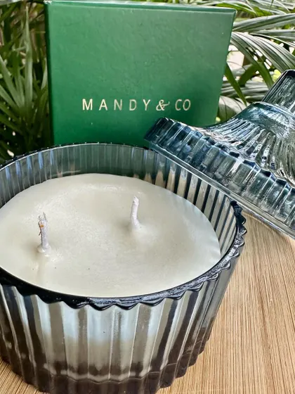 The double-wick vanilla candle with its lid off, showing the smooth, creamy soy wax ready to be lit.