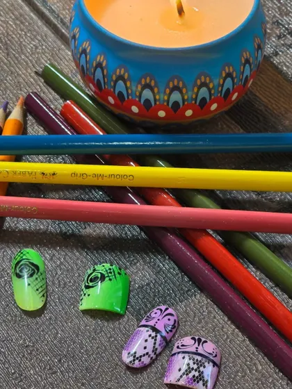 Abstract and geometric matching nail art sets. These bold designs show how you can play with color and pattern to create a cohesive look for both hands and feet.