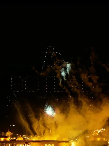 A stunning shot of our BotLab logo formed by drones, with fireworks exploding in the background. A perfect example of the magical moments our photographers capture.