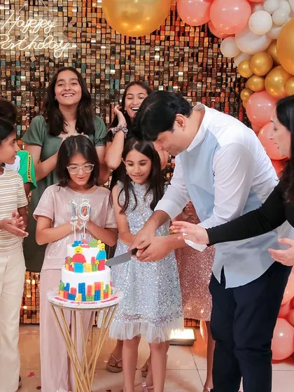 A charming 'Winnie the Pooh' themed birthday party, with rustic decor, character cutouts, and honey pot props, creating a sweet and cozy atmosphere.