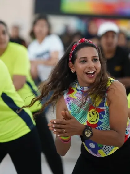 A candid shot capturing the fun and connection in a group Zumba class. The smiles on everyone's faces are what make these sessions so special.
