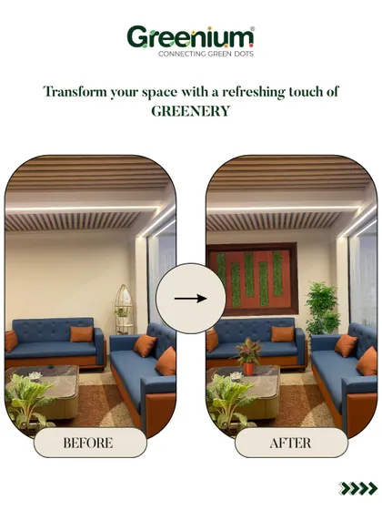 A living room transformation. We added a framed green wall art piece and several potted plants to this seating area, adding color, texture, and a sense of calm to the room.