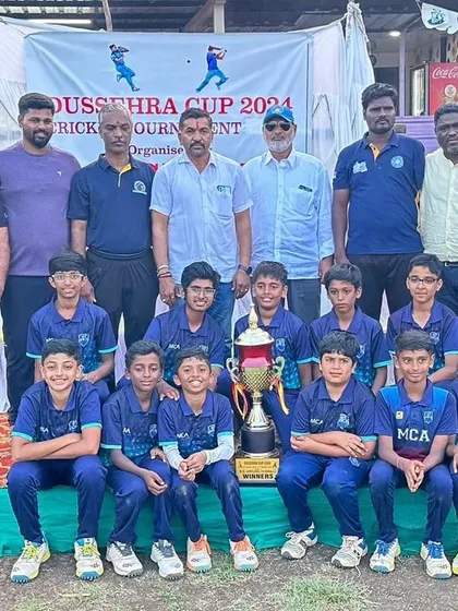 The winning team and officials posing with the Dasara Cup in Hubli. A proud moment for the entire academy.
