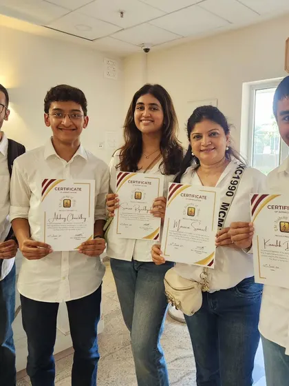 Smiles all around as another group of our performers receive their participation certificates. We believe in recognizing the hard work and dedication of every student who contributes to our community events.
