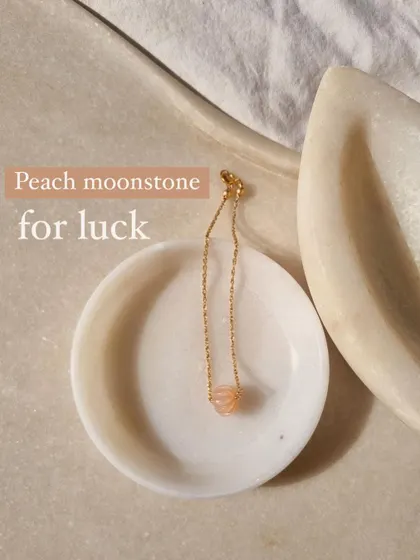 Another look at the Peach Moonstone melon charm bracelet, a beautiful piece for emotional stability and luck.