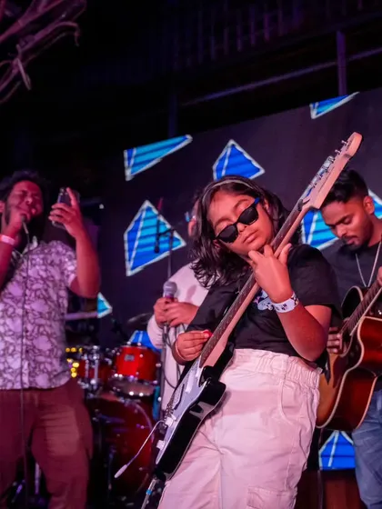 A young bassist owning the stage with her band at the student showcase. We love seeing our students embrace their inner rockstar and perform with such coolness and skill.