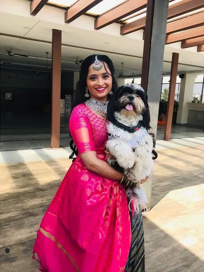 A bride and her best friend. I love it when pets are part of the wedding. Her half saree look is fun and youthful, perfect for a pre-wedding event.