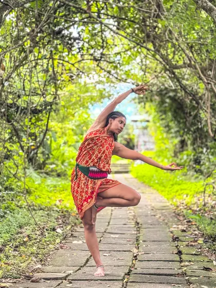 In a variation of Tree Pose, or Vrikshasana, on the Campuhan Ridge Walk in Ubud. Surrounded by lush greenery, this pose reminds me to stay grounded, rooted, and focused, just like the trees around us.