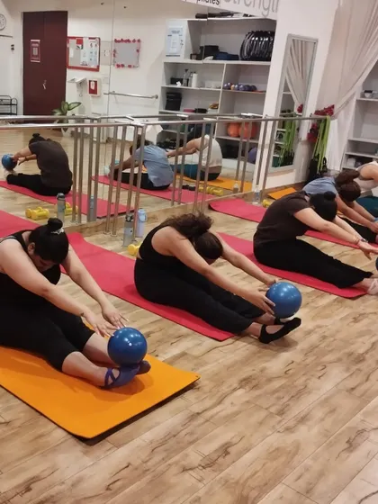 Various shots of our vibrant and engaging Mat Pilates group classes.