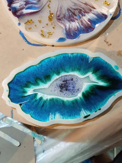 Another example from my 3D flower and coral resin art workshop. This piece shows a beautiful coral effect with vibrant blue and green colours.