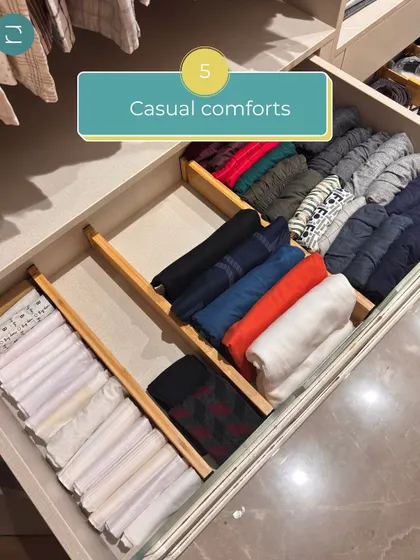Casual comforts like socks and undergarments are neatly organized in drawers with dividers, separated by color and pattern.