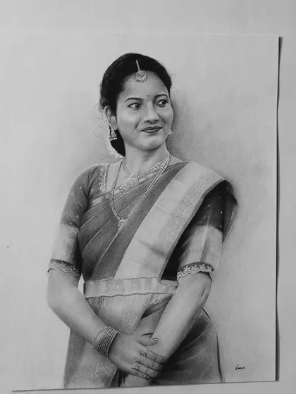 A finished portrait of a woman in a saree.