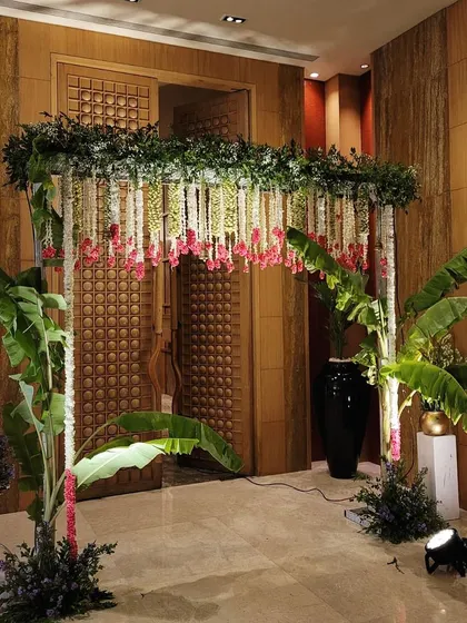 The full view of the indoor entrance arch, creating a beautiful passageway for guests and the couple.