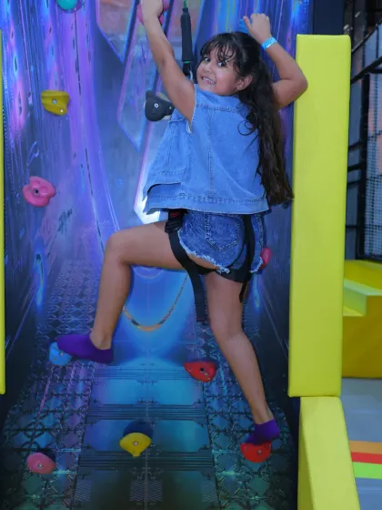This climber is almost at the top! We love seeing kids achieve their goals and feel a sense of accomplishment.