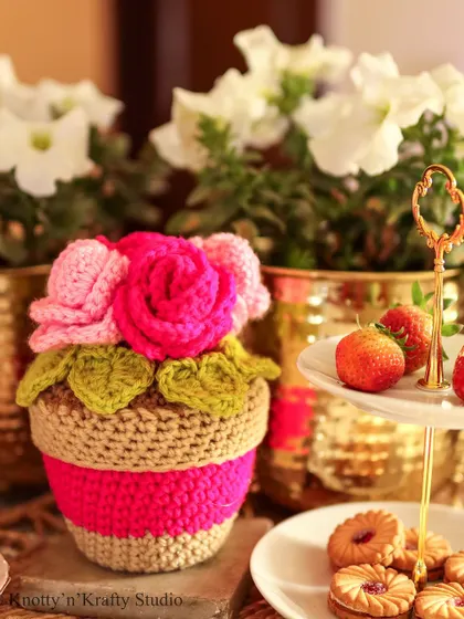 Rosie Posies. A close-up of this sweet little pot of crochet roses, perfect for gifting or for brightening your own space.