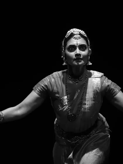A black and white capture from "Sarvasya" in London, showcasing a moment of quiet intensity.