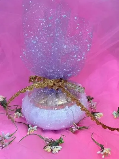 The wrapped version of the gift box, shown here with a sparkly purple net that adds a touch of glamour.