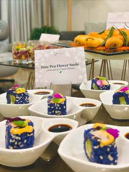 Our signature Blue Pea Flower Sushi, a visually stunning appetizer that perfectly matched the playful and elegant theme of the night.