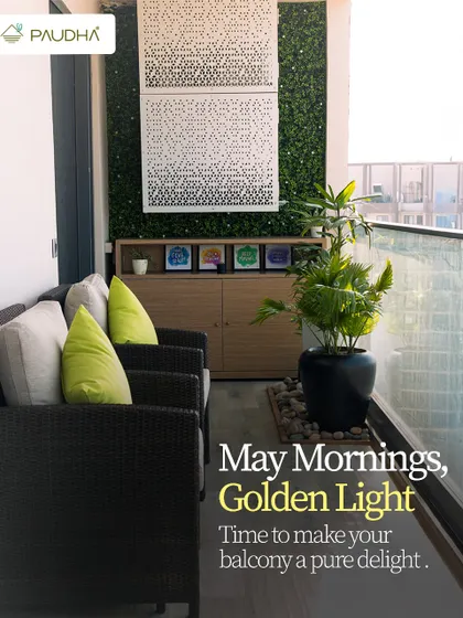 May mornings and golden light. This balcony is designed to be a pure delight, with comfortable wicker armchairs, vibrant green cushions, and a vertical garden wall that adds life and privacy.
