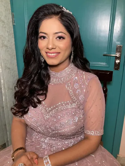 A soft engagement glam look for my bride Neha. The focus was on pink-toned eyeshadow and a natural, skin-like finish.