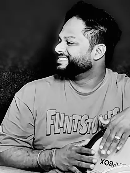A candid black and white shot. This captures my love for my instrument, the darbuka, and the joy music brings me.