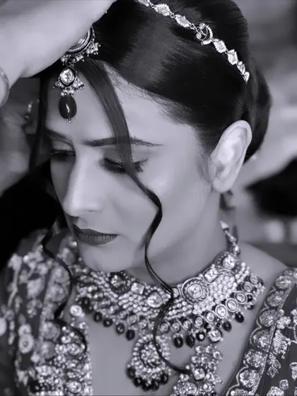 A timeless and regal black and white shot of my bride in Igatpuri. This captures the emotion and the intricate details of her jewellery and hair styling.