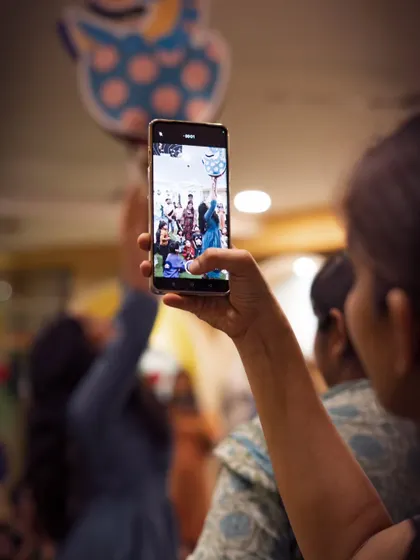 A behind-the-scenes look at guests capturing their own memories. It's a reminder that the goal is to create moments so beautiful that everyone wants to photograph them.