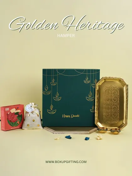 The "Golden Heritage" hamper combines elegance and utility. It features a beautiful gift box, an ornate brass tray, and other festive goodies perfect for corporate Diwali gifting.
