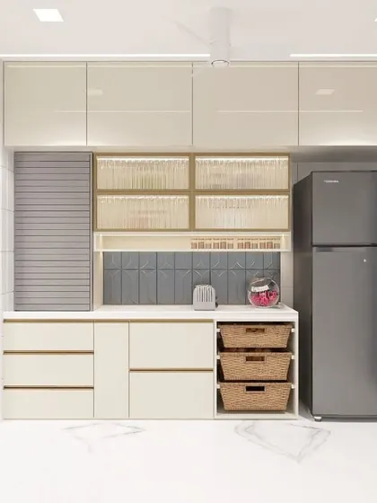 Functionality is at the core of this utility and kitchen area. The design incorporates open wicker baskets for vegetable storage, a rolling shutter to hide appliances, and frosted glass cabinets. This layout ensures everything has its place, keeping the kitchen organized and efficient.
