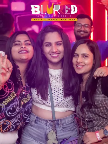 A group of friends posing together at Blurred. My Monday night parties are a great way to start the week with high energy.
