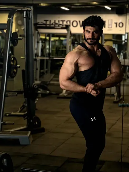 See the veins. A side pose highlighting my vascularity.