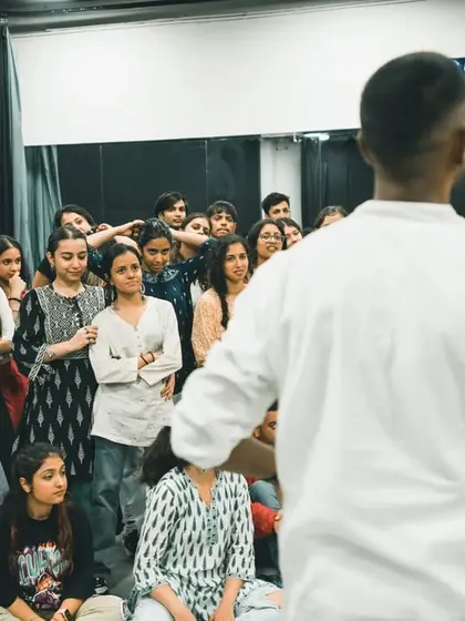 The students listening intently. A teacher is only as good as his students' willingness to learn.