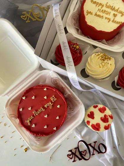 Another view of the red bento and cupcake set, showcasing the "You Power my BI" cake. It's a great gift idea for a tech-savvy significant other.