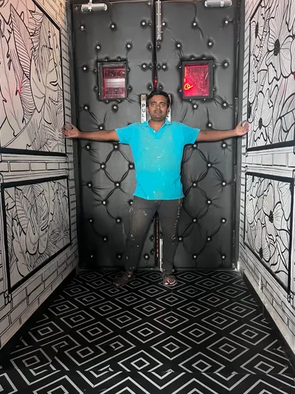 This 2D-style, black and white artwork transformed the entryway of a restaurant in Brigade Road. The design creates an optical illusion, making the space feel like a comic book panel.