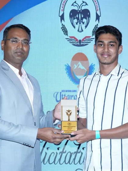 A proud moment for one of our swimmers receiving an award.