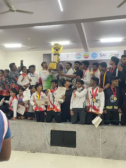 The entire team on stage, celebrating our championship victory. This is a collective effort, and every member of the TMA family contributed to this success.