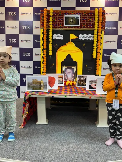 Two young students in their traditional attire for the Gurpurab celebration. We encourage children to embrace and celebrate the diversity of our country's festivals.