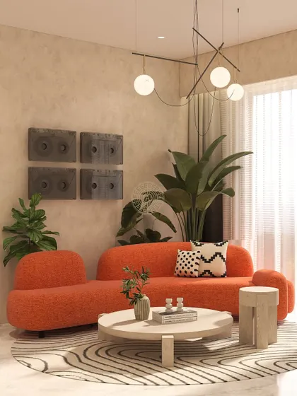 A bright orange curved sofa adds a bold pop of color to this seating area within a master suite. The design mixes modern furniture with rustic wall art and natural elements.