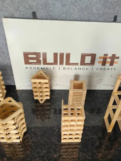 A collection of different tower designs created during a workshop. This shows the variety of creative solutions that can emerge when a team is given the same set of tools and a common goal.